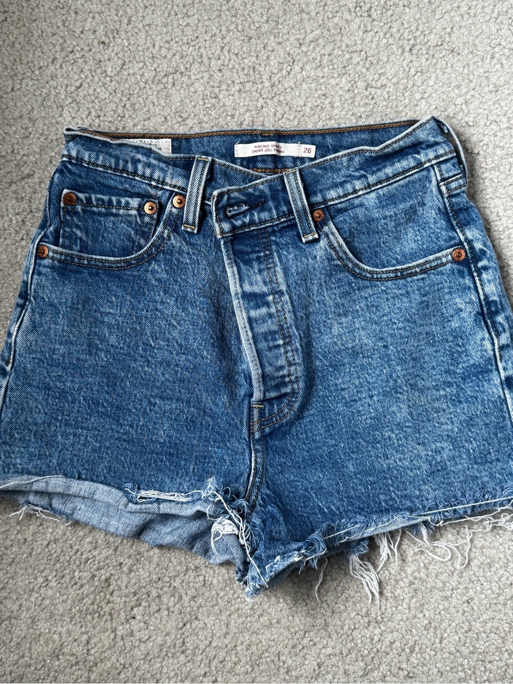 Levi's Medium Blue Distressed Denim Shorts